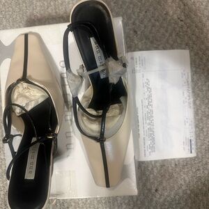 Ann Marino Cream Pumps with Black T-Strap Accents